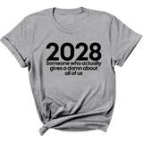 2028 Someone Who Actually Gives a Damn About All of Us Unisex Tee-T-Shirt-The Original God Ain't Petty But I Am