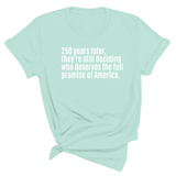 250 Years Later, They're Still Deciding Who Deserves the Full Promise of America Unisex Tee-T-Shirt-The Original God Ain't Petty But I Am