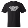 Stop trying to build with people who voted for him three times. We never voted from him once *BLACK TALL TEE* Unisex Tee-T-Shirt-The Original God Ain't Petty But I Am