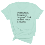 Trust your eyes. The racists in charge don't think any Black person is qualified Unisex Tee-T-Shirt-The Original God Ain't Petty But I Am